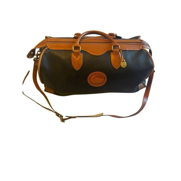 Dooney and Bourke vintage Rare leather black camel tan duffle carry on - EUC - Picture 1 of 16